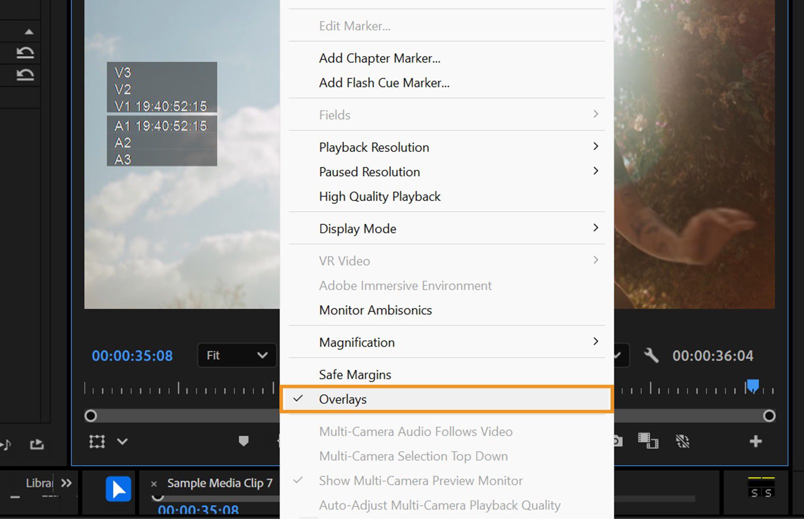 La opción Superposiciones está habilitada y resaltada en el menú contextual del Monitor de programa.