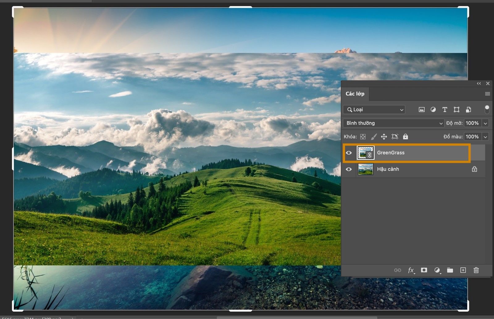 Không gian làm việc trong Photoshop hiển thị những ngọn đồi xanh và bầu trời. Trong bảng Lớp, lớp Đối tượng thông minh GreenGrass dạng liên kết đang được chọn.