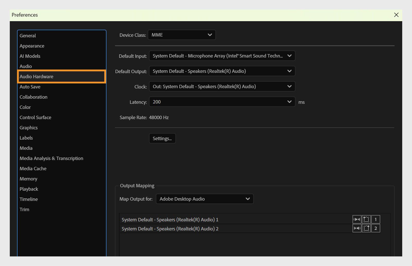 El cuadro de diálogo Configuración muestra el panel Audio Hardware con opciones para configurar los dispositivos de audio.