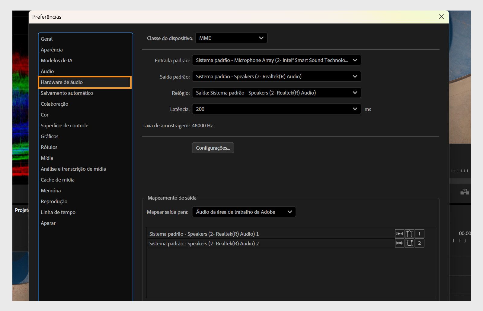 A caixa de diálogo “Preferências” exibe o painel “Hardware de áudio” com opções para configurar os dispositivos de áudio.
