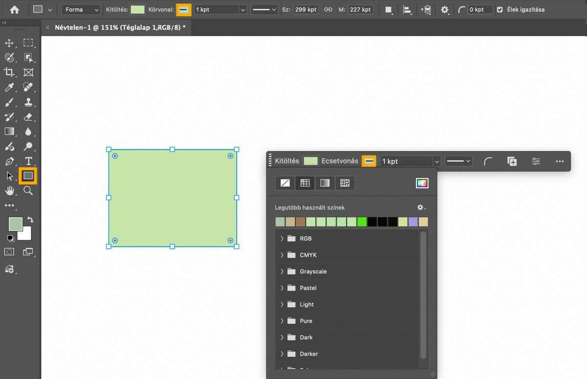 A Téglalap eszköz ki van emelve az Eszközök panelen, és egy téglalap van rajzolva a vászonra.A Környezetfüggő feladatsáv látható, és mutatja a Kitöltés legördülő menüt.