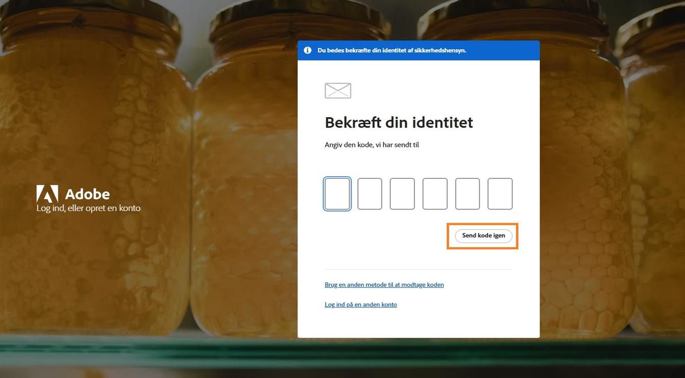 Knappen Send kode igen i vinduet Verificer din identitet giver dig mulighed for at anmode om en ny bekræftelseskode.