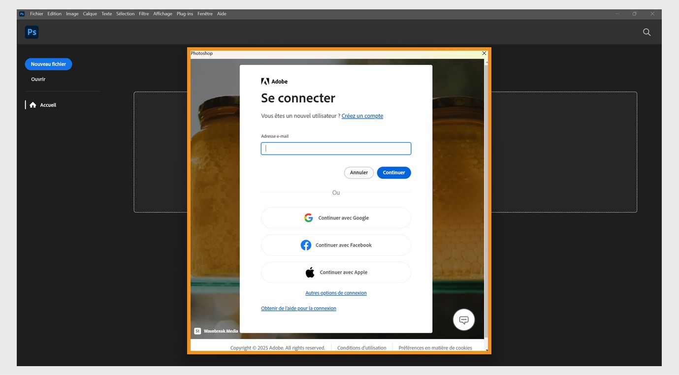 L'invite de connexion dans les applications Creative Cloud affiche le champ pour saisir votre adresse e-mail et les options pour continuer ou annuler, obtenir de l'aide pour la connexion, créer un nouveau compte et se connecter à l'aide d'un compte de réseau social. 