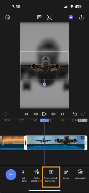 Tijdlijn met een geselecteerde clip en de optie Achtergrond herstellen gemarkeerd in de onderste werkbalk.