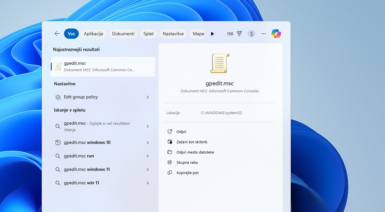 Iskalna vrstica sistema Windows prikazuje Urejevalnik pravilnika skupine ali datoteko gpedit.msc.