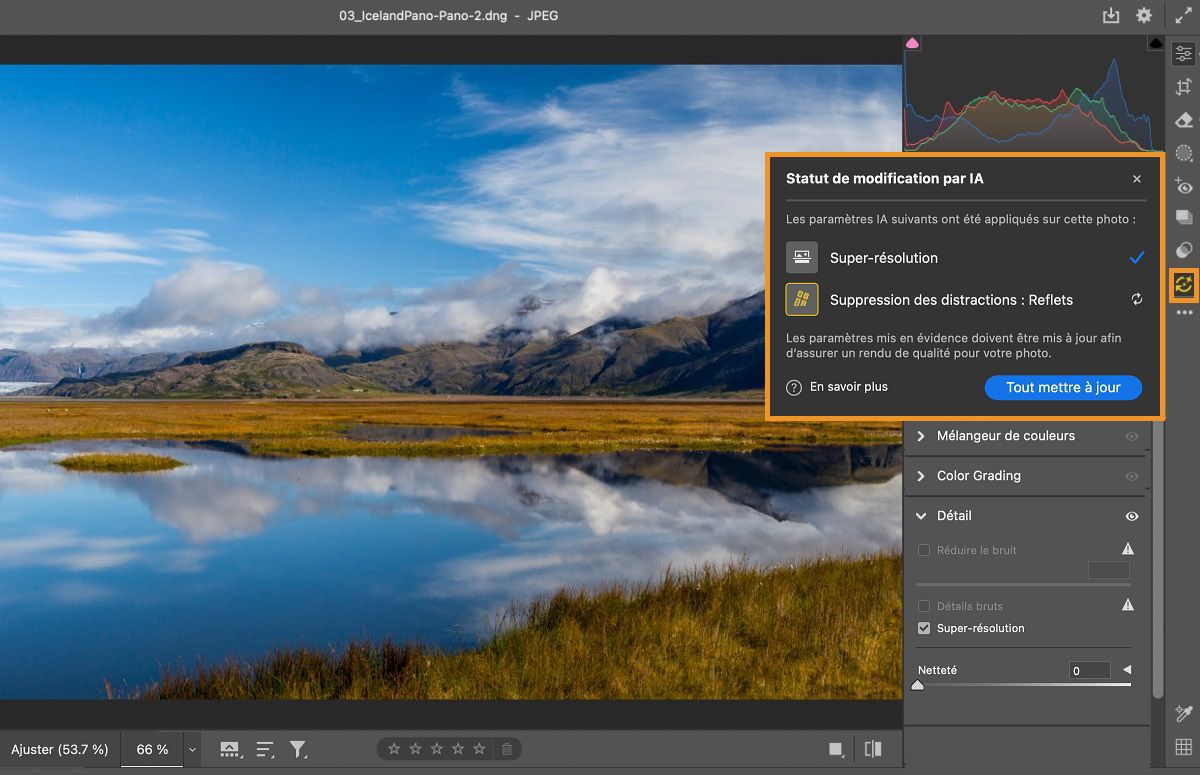 Interface ACR affichant une image de paysage avec des montagnes, un lac et des champs d’herbe. Le panneau Statut de modification par IA montre que les options « Super-résolution » et « Suppression des distractions : Reflets » ont été appliquées, avec une option « Tout mettre à jour » mise en évidence.