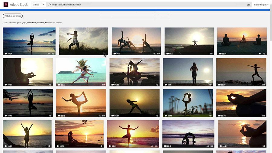 Adobe Stock affiche des clips vidéo de personnes pratiquant le yoga sur la plage.