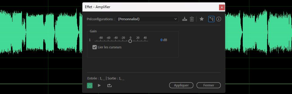 La boîte de dialogue de l'effet Amplification est ouverte et il y a des options de curseurs Gain et Lier pour l'ajustement.