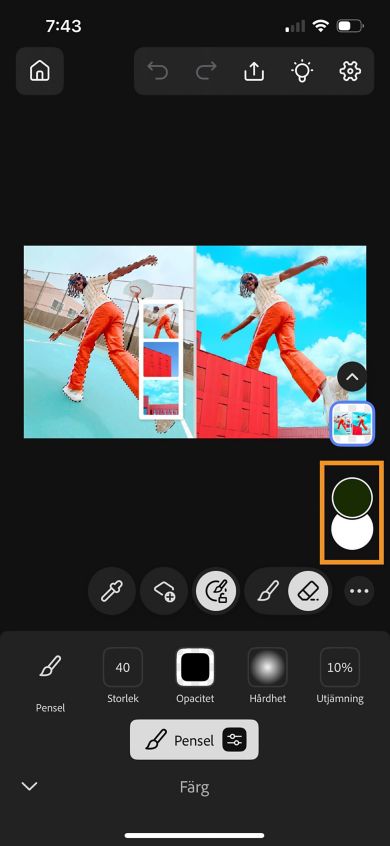 Photoshop på iPhone-arbetsytan visar den markerade färgväljaren, som används för att lägga till förgrundsfärgen.