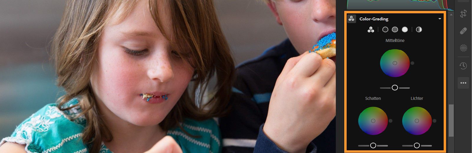 Zwei Kinder in einem Bild, im Bedienfeld „Bearbeiten“ ist das Bedienfeld „Color Grading“ hervorgehoben Drei Schieberegler für Mitteltöne, Schatten und Lichter sind eingestellt.