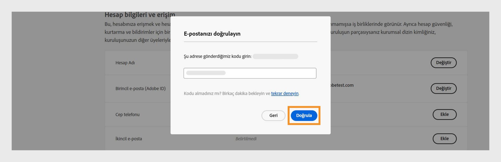 Doğrulama kodunun girileceği bir alan ile e-posta adresini doğrulama, kodu yeniden almayı deneme ve işlemi iptal etme seçeneklerinin gösterildiği E-posta adresinizi onaylayın penceresi. 
