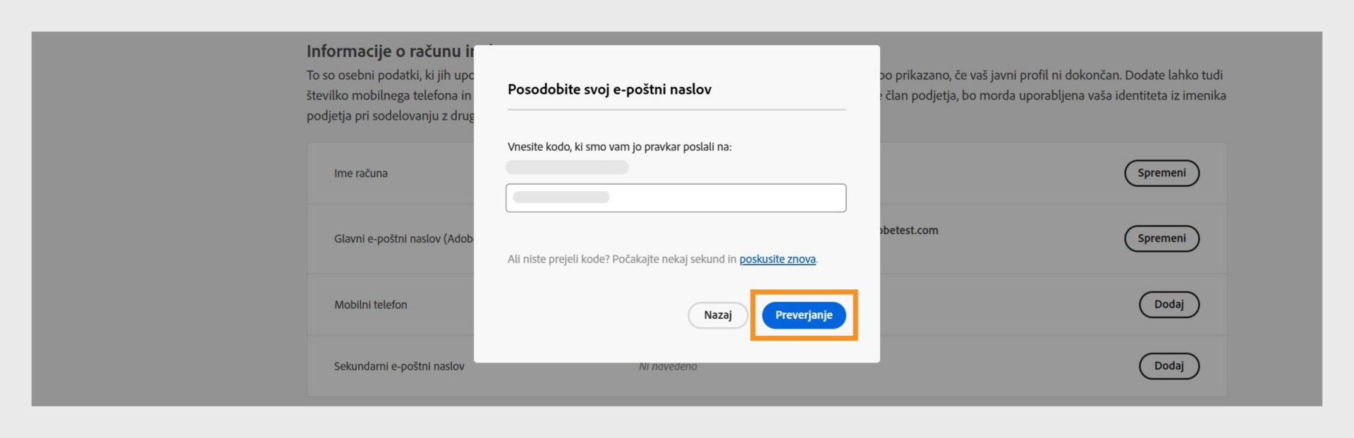 Okno za potrditev e-poštnega naslova, ki prikazuje polje za vnos potrditvene kode in možnosti za potrditev e-poštnega naslova, poskus vnovičnega pridobivanja kode in preklic postopka. 