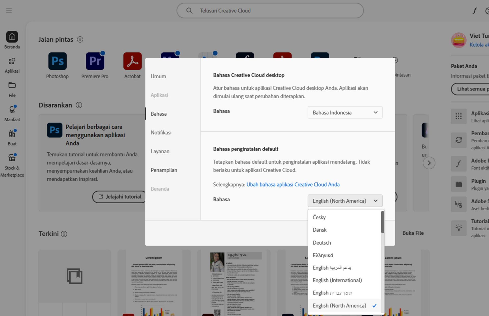 Tab Bahasa pada jendela Preferensi menampilkan opsi untuk memilih bahasa Creative Cloud Desktop dan bahasa instalasi default.