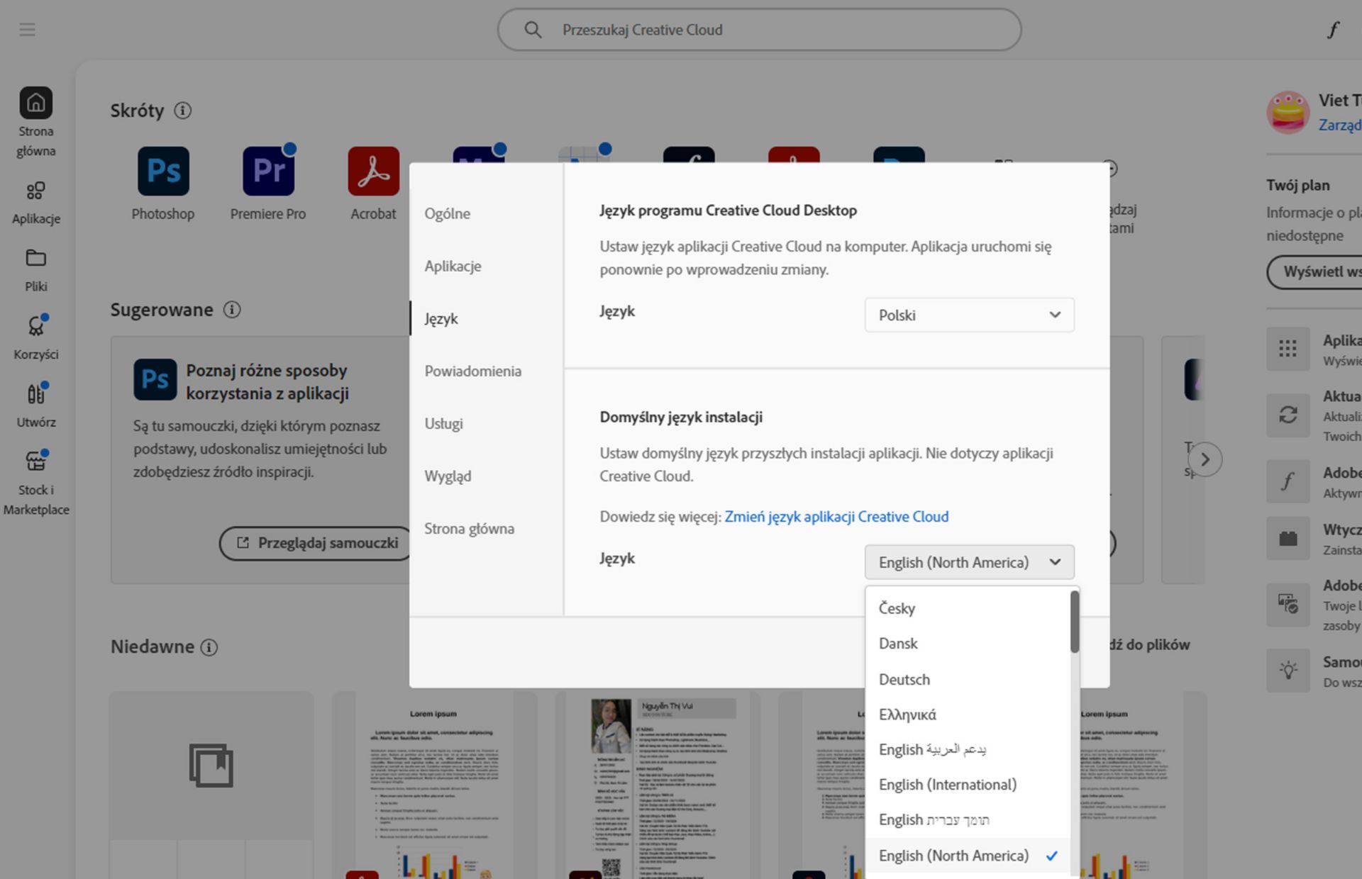 Karta Język w oknie Preferencje pokazuje opcje wyboru języka Creative Cloud Desktop oraz domyślnego języka instalacji.