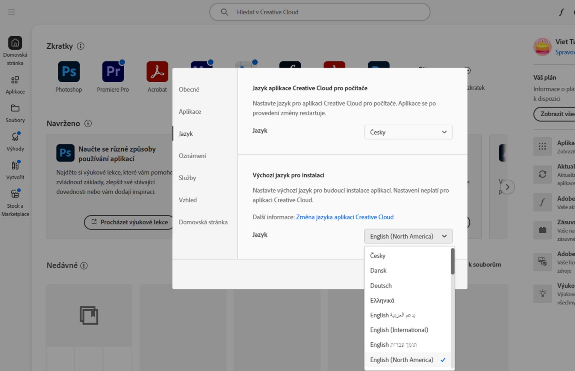 Karta Jazyk v okně Předvolby zobrazuje možnosti pro výběr jazyka aplikace Creative Cloud pro počítače a výchozího jazyka instalace.