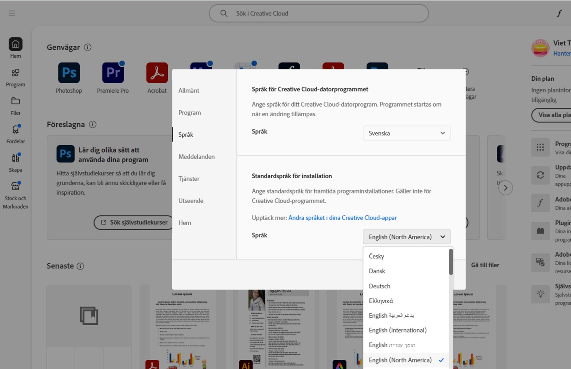 Fliken Språk i fönstret Inställningar visar alternativ för att välja språk för Creative Cloud-datorprogrammet och standardspråk för installation.
