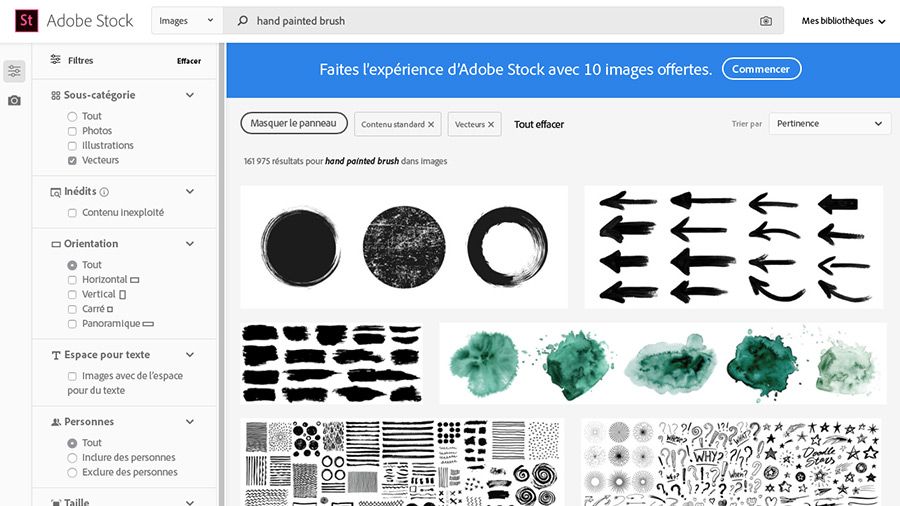 Site web Adobe Stock affiché dans un navigateur et « hand painted brush » saisi dans le champ de recherche