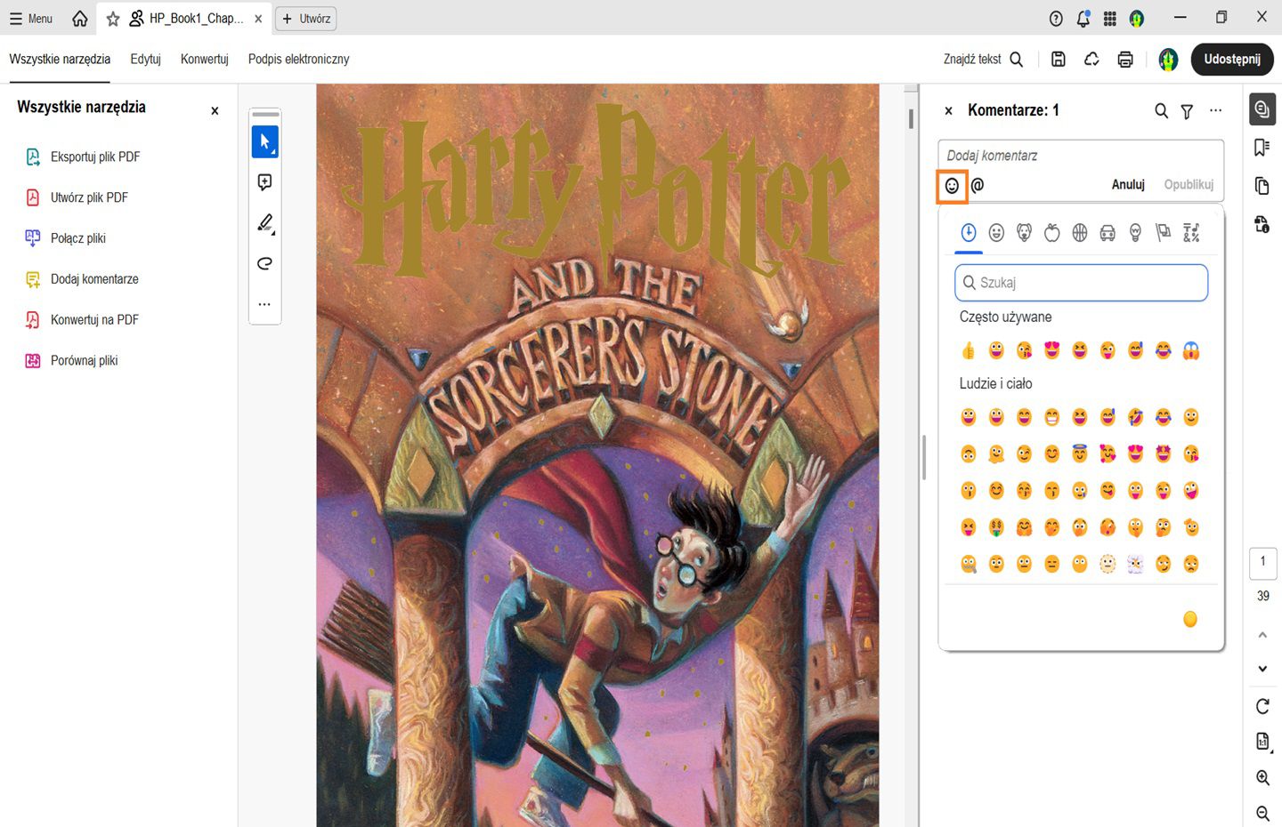 Zostanie wyświetlone okienko emotikonów w panelu komentarzy. 