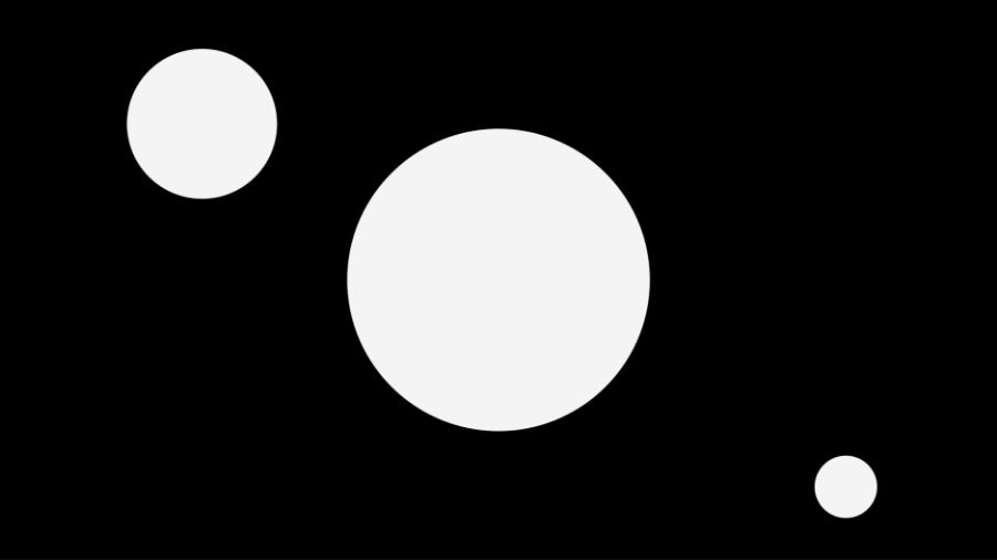 White circles on black background showing emphasis and hierarchy in graphic design