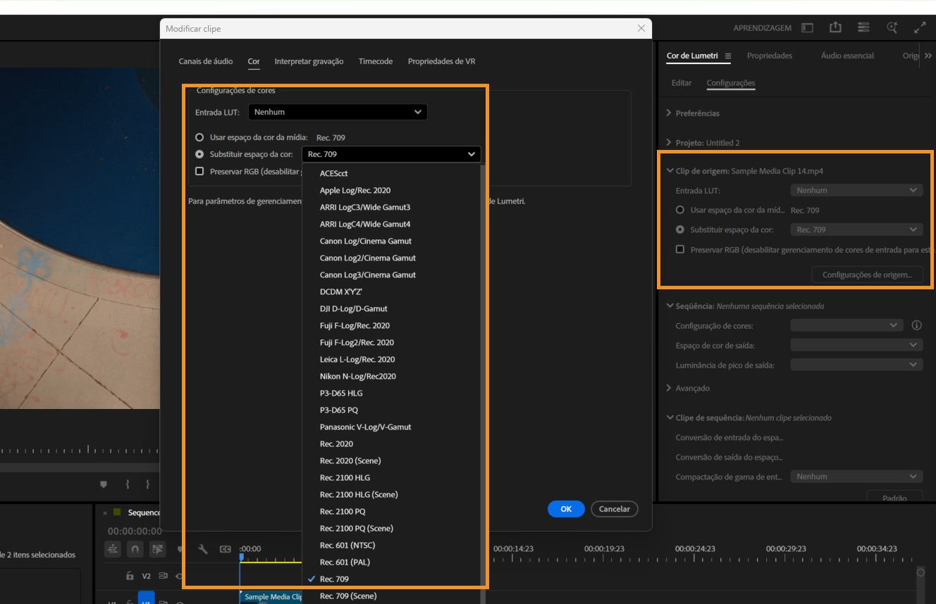 A caixa de diálogo “Modificar clipe” está aberta. Na guia “Cor”, em “Configurações de cor”, o menu suspenso “Substituir espaço de cores da mídia” está aberto, com opções de “Espaço de cores da mídia” para escolher.