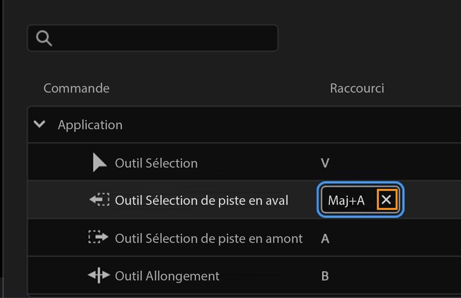 Le panneau montre que Maj+A est actuellement attribué à l'outil de sélection de piste vers l'arrière, et vous pouvez cliquer sur X pour supprimer le raccourci.