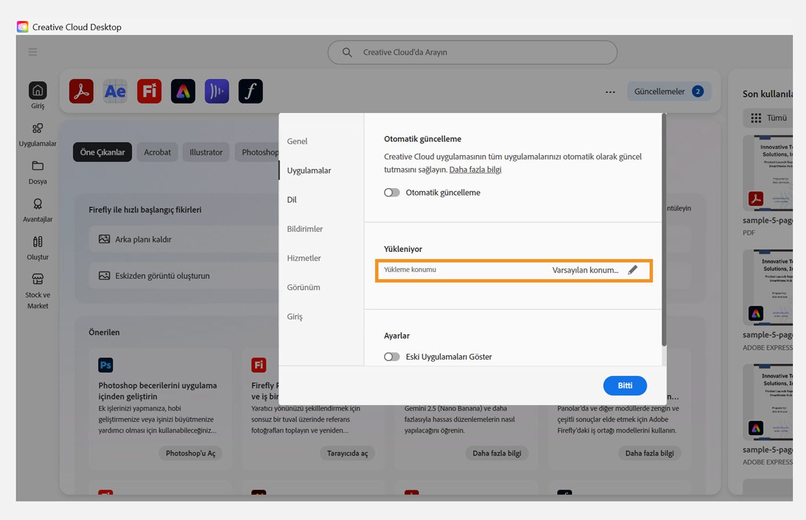 "Uygulamalar" sekmesinde açık olan Adobe Creative Cloud tercihleri paneli, kullanıcıların varsayılan yükleme konumunu ayarlayabilecekleri "Yükleniyor" bölümünü vurguluyor.