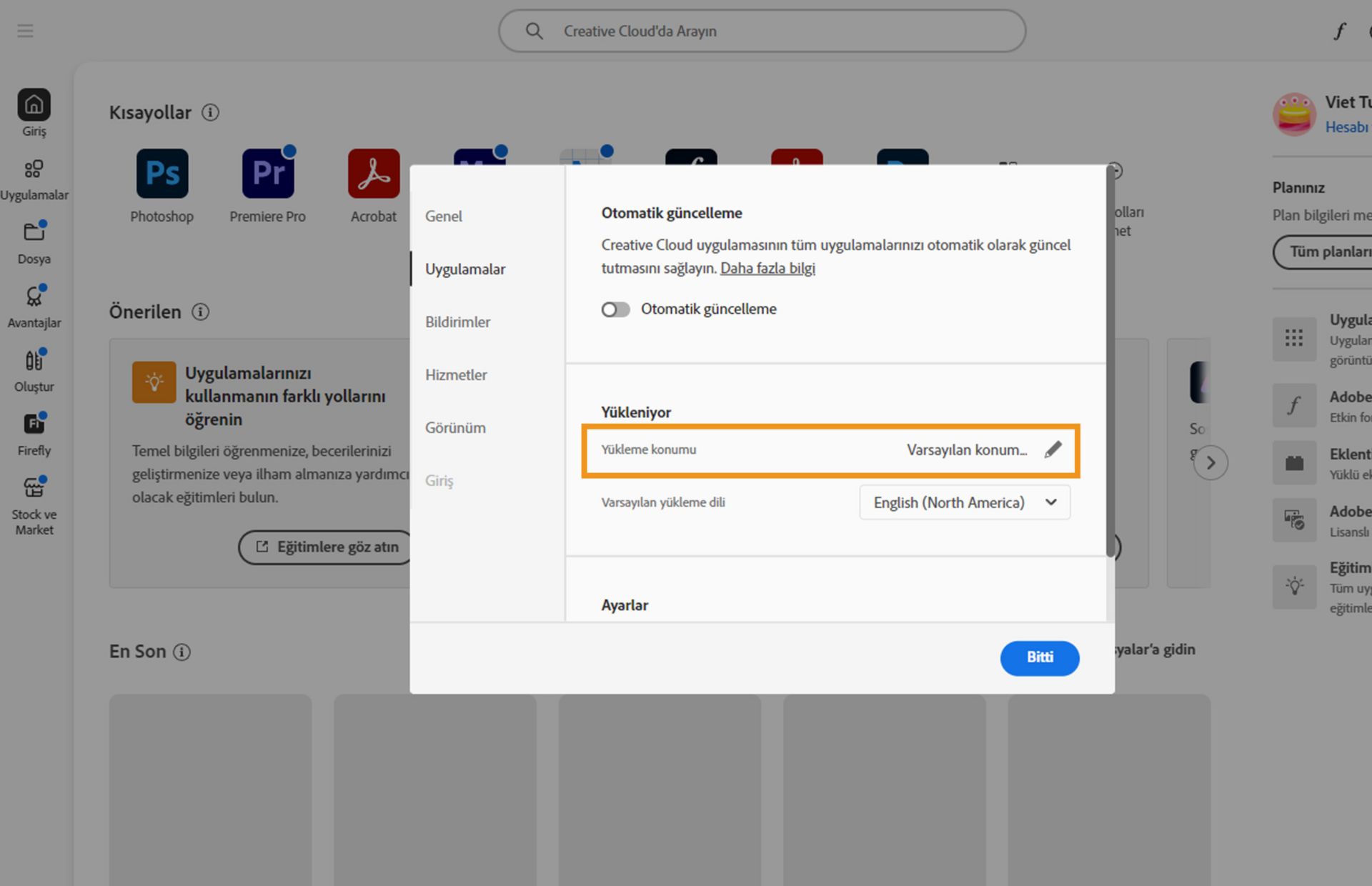 &quot;Uygulamalar&quot; sekmesinde açık olan Adobe Creative Cloud tercihleri paneli, kullanıcıların varsayılan yükleme konumunu ayarlayabilecekleri &quot;Yükleniyor&quot; bölümünü vurguluyor.
