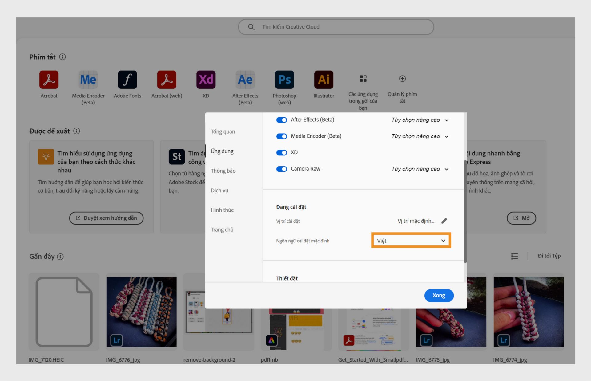 Cửa sổ lựa chọn ưu tiên về Adobe Creative Cloud hiển thị các tùy chọn để chọn ngôn ngữ cho Creative Cloud trên máy tính và ngôn ngữ cài đặt mặc định, với tiếng Anh được chọn.