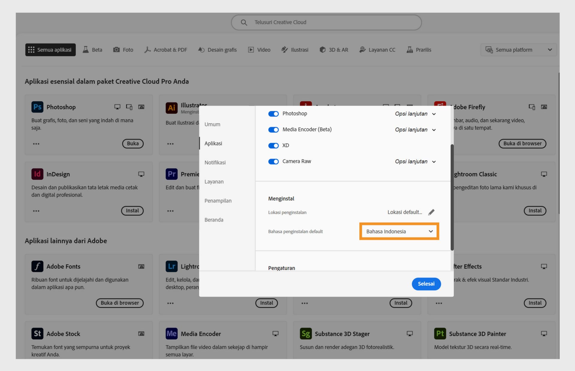 Jendela preferensi Adobe Creative Cloud menampilkan opsi untuk memilih bahasa Creative Cloud Desktop dan bahasa instalasi default, dengan bahasa Inggris yang dipilih.