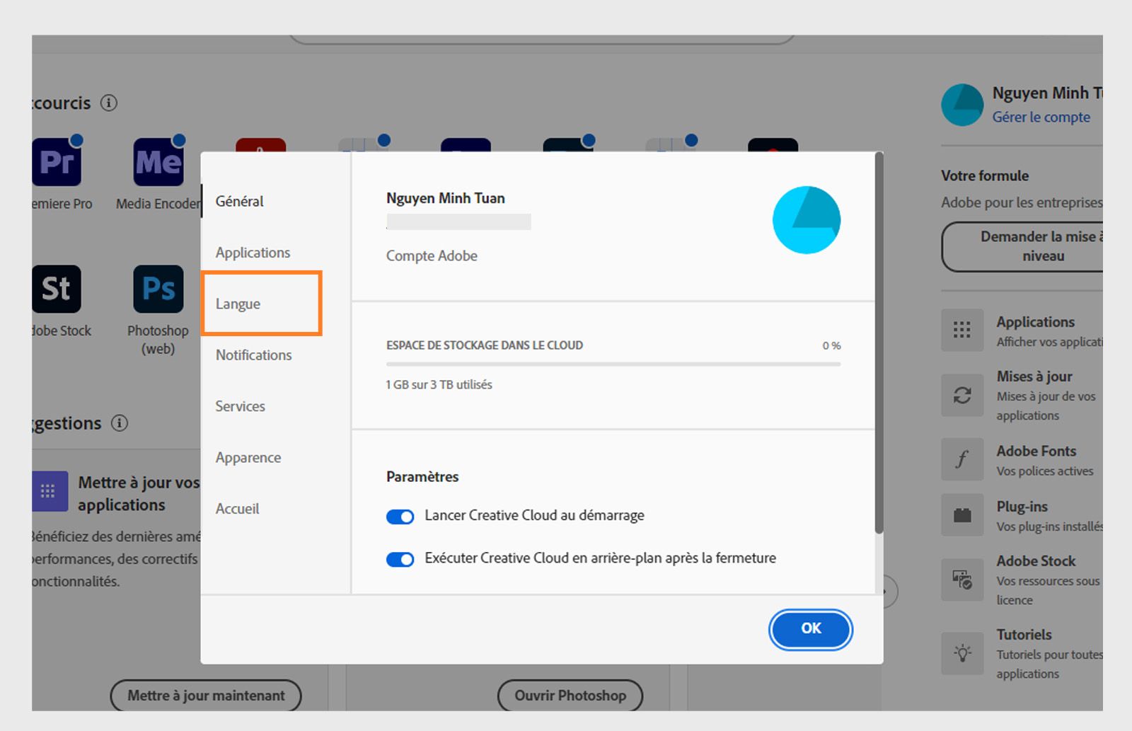 Panneau des préférences d'Adobe Creative Cloud ouvert sur l'onglet « Langue », mettant en évidence l'option permettant de définir la langue d'installation par défaut de l'appli.