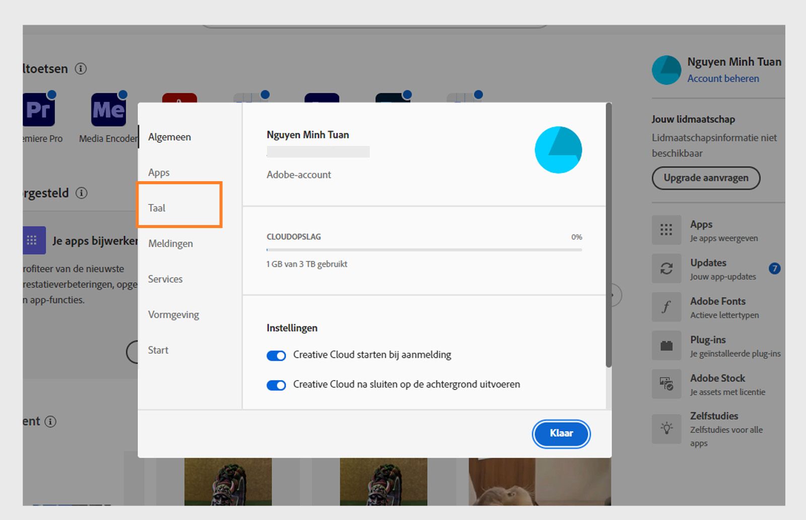 Het voorkeuren-paneel van Adobe Creative Cloud is geopend op het tabblad 'Taal', waarbij de optie om de standaardtaal voor app-installatie in te stellen is gemarkeerd.