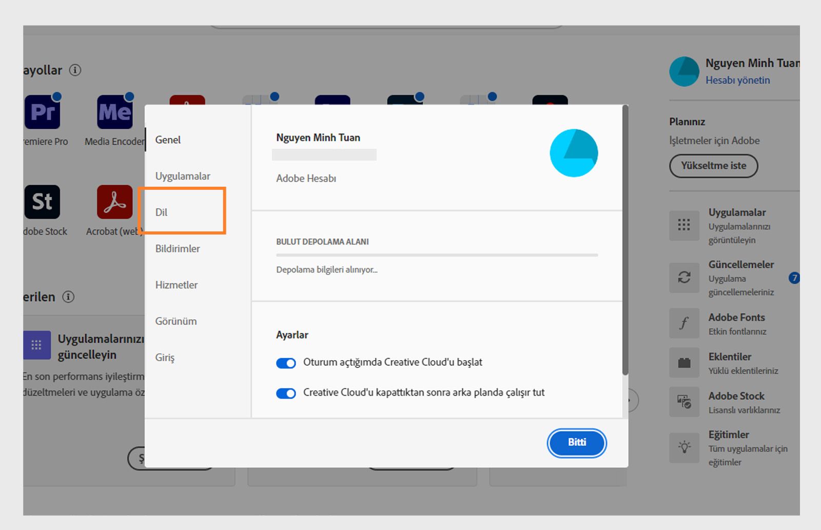 "Dil" sekmesinde açık olan Adobe Creative Cloud tercihler paneli, varsayılan uygulama yükleme dilini ayarlama seçeneğini vurguluyor.