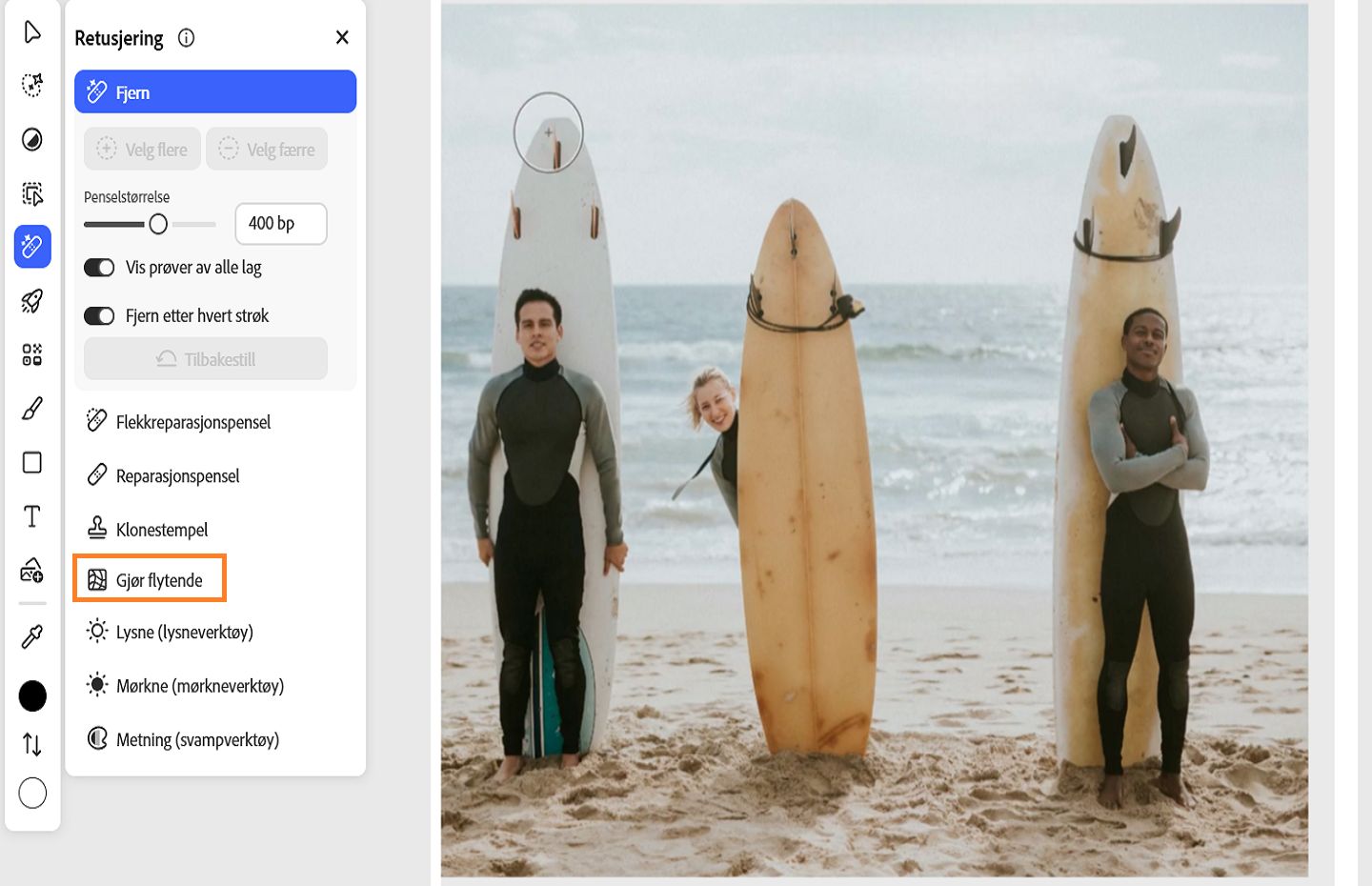 Retusjering-panelet viser det uthevede Gjør flytende-verktøyet, som brukes til å forvrenge, retusjere og forbedre bilder.