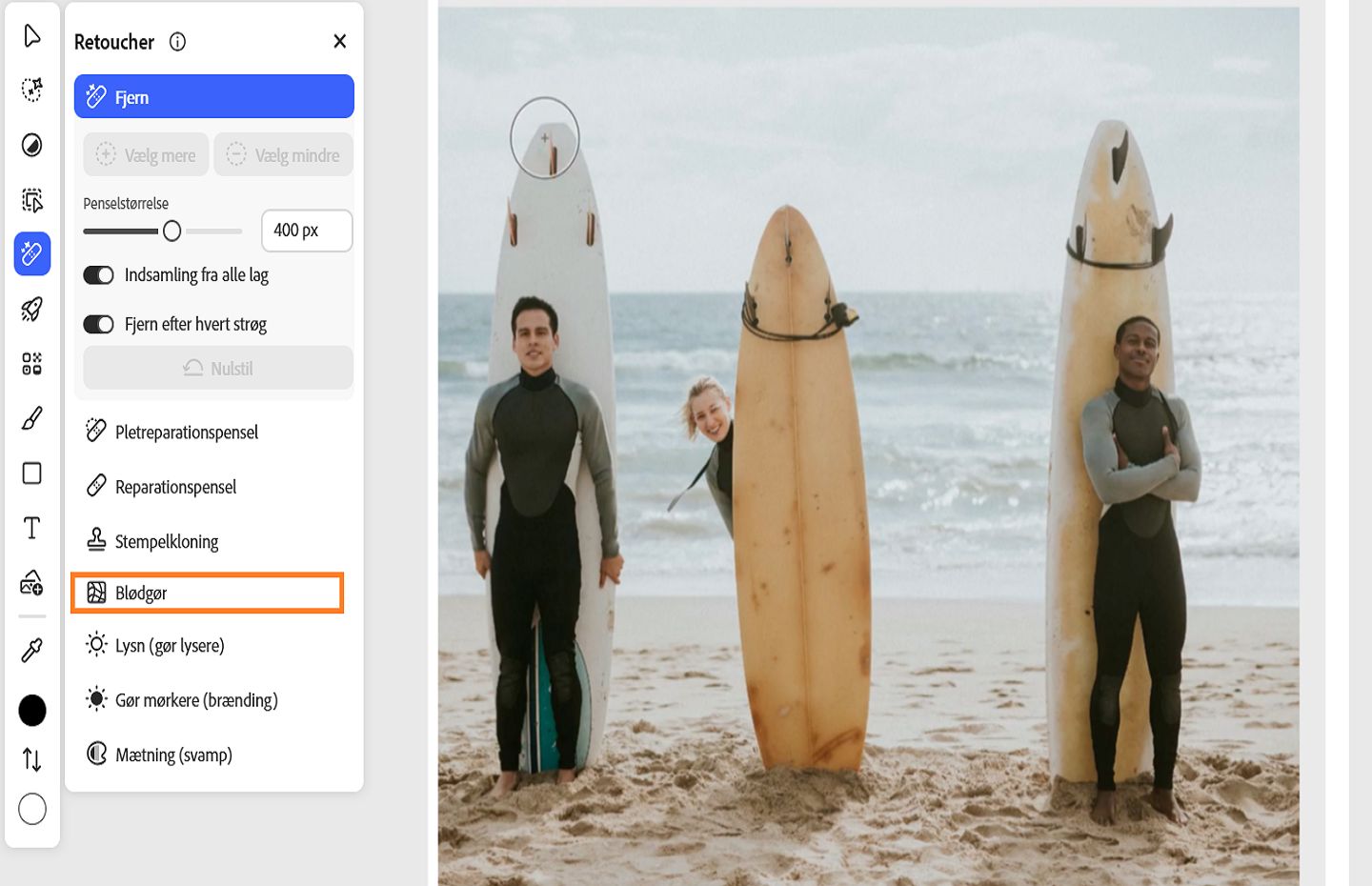 Retoucher-panelet viser det fremhævede Liquify-værktøj, som bruges til at forvrænge, retouchere og forbedre billeder.