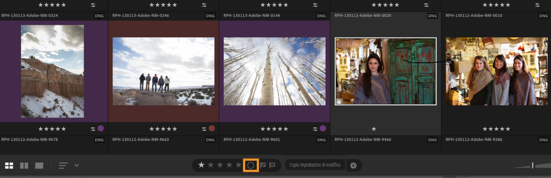 Vista griglia di Lightroom che mostra le foto con etichette colore e il filtro Etichetta colore selezionato nella barra degli strumenti.
