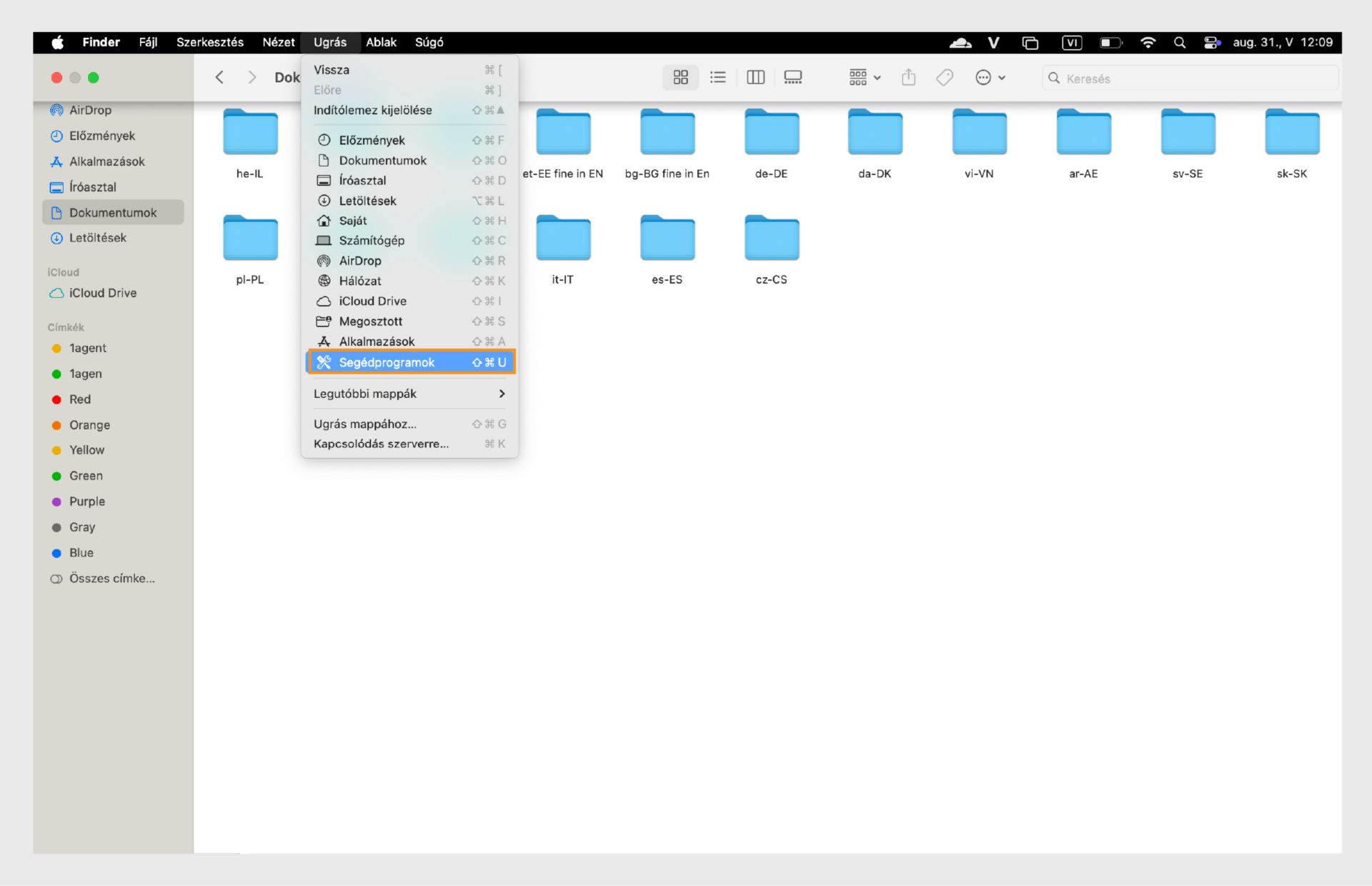 A macOS Finder ablak kiemeli a Segédprogramok mappát a bal oldali oldalsávban.