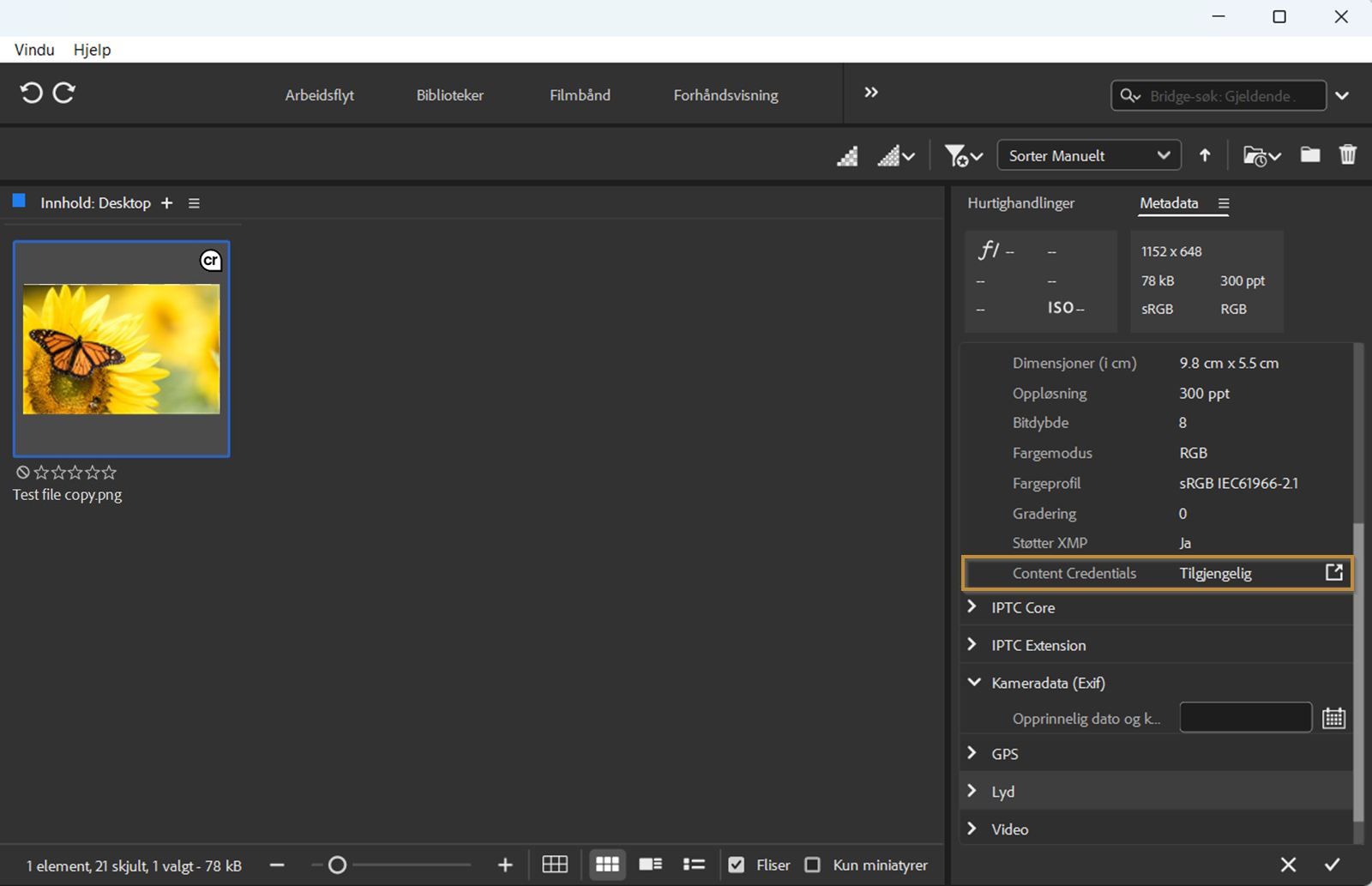Innhold-panelet åpnes i Bridge og viser ressursen som er aktivert med Content Credentials. Metadata-panelet vises på høyre side av skjermen med Content Credentials-statusen fremhevet.
