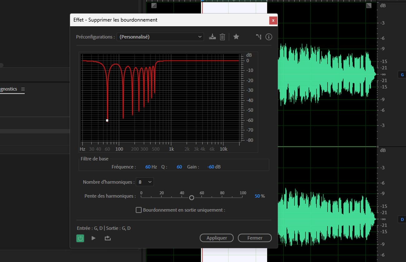 La boîte de dialogue de l’effet DeHummer est ouverte, et des options pour définir la Fréquence, le Nombre d'harmoniques, la Pente harmonique et d'autres sont disponibles.
