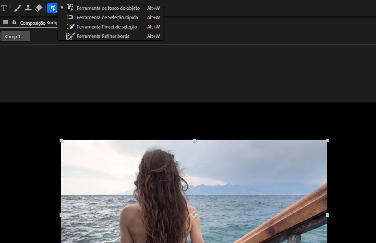 As ferramentas principais da Máscara de Objeto estão visíveis na barra de menu e no painel Composição. Um elemento visual é selecionado para propagação e congelamento.