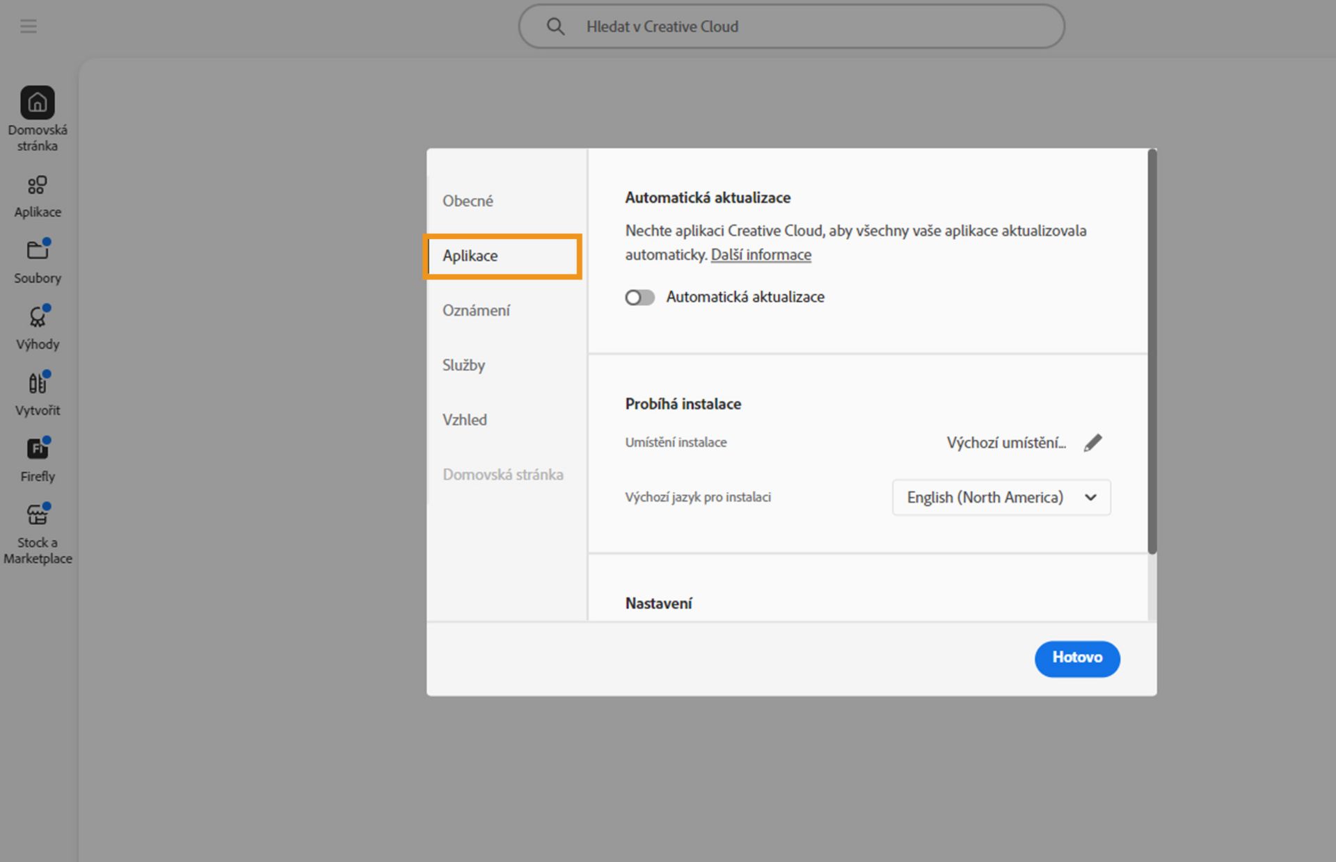 Panel předvoleb Adobe Creative Cloud otevřený na kartě Aplikace, zobrazující možnosti automatické aktualizace, umístění instalace a využití šířky pásma.