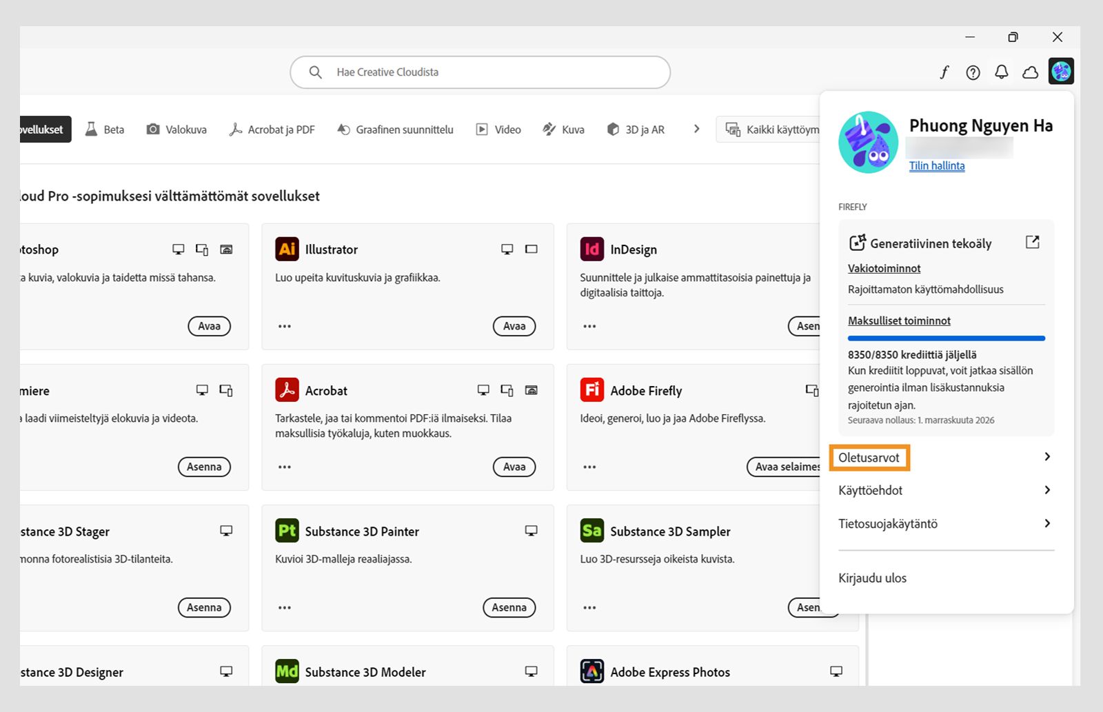 Creative Cloud -tietokonesovelluksen aloitusnäytössä näkyy avattava Tili-valikko ja Kirjaudu ulos -vaihtoehto. 