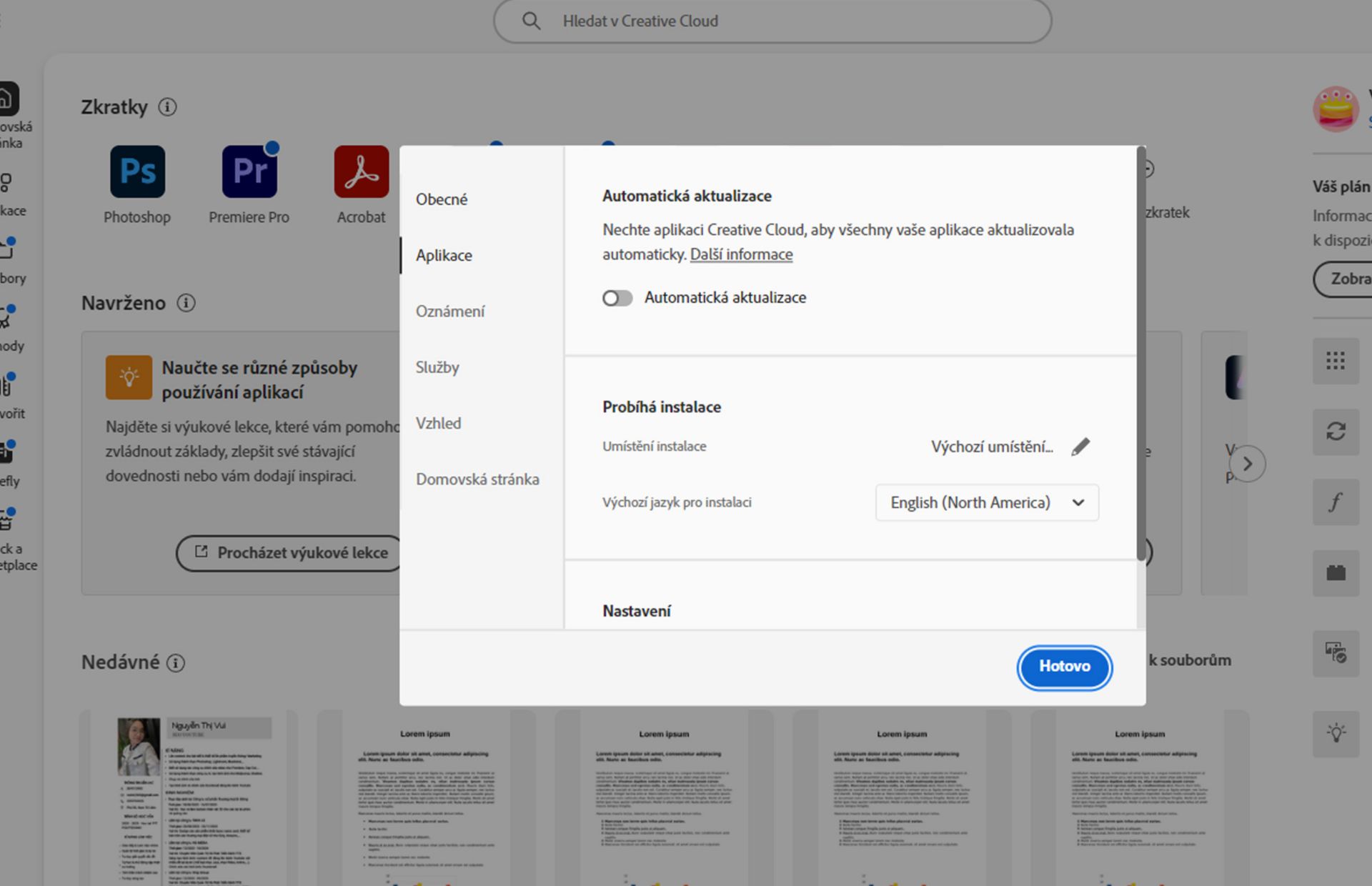 Panel předvoleb Adobe Creative Cloud otevřený na kartě Jazyk se zvýrazněnou možností nastavení výchozího jazyka instalace aplikace.