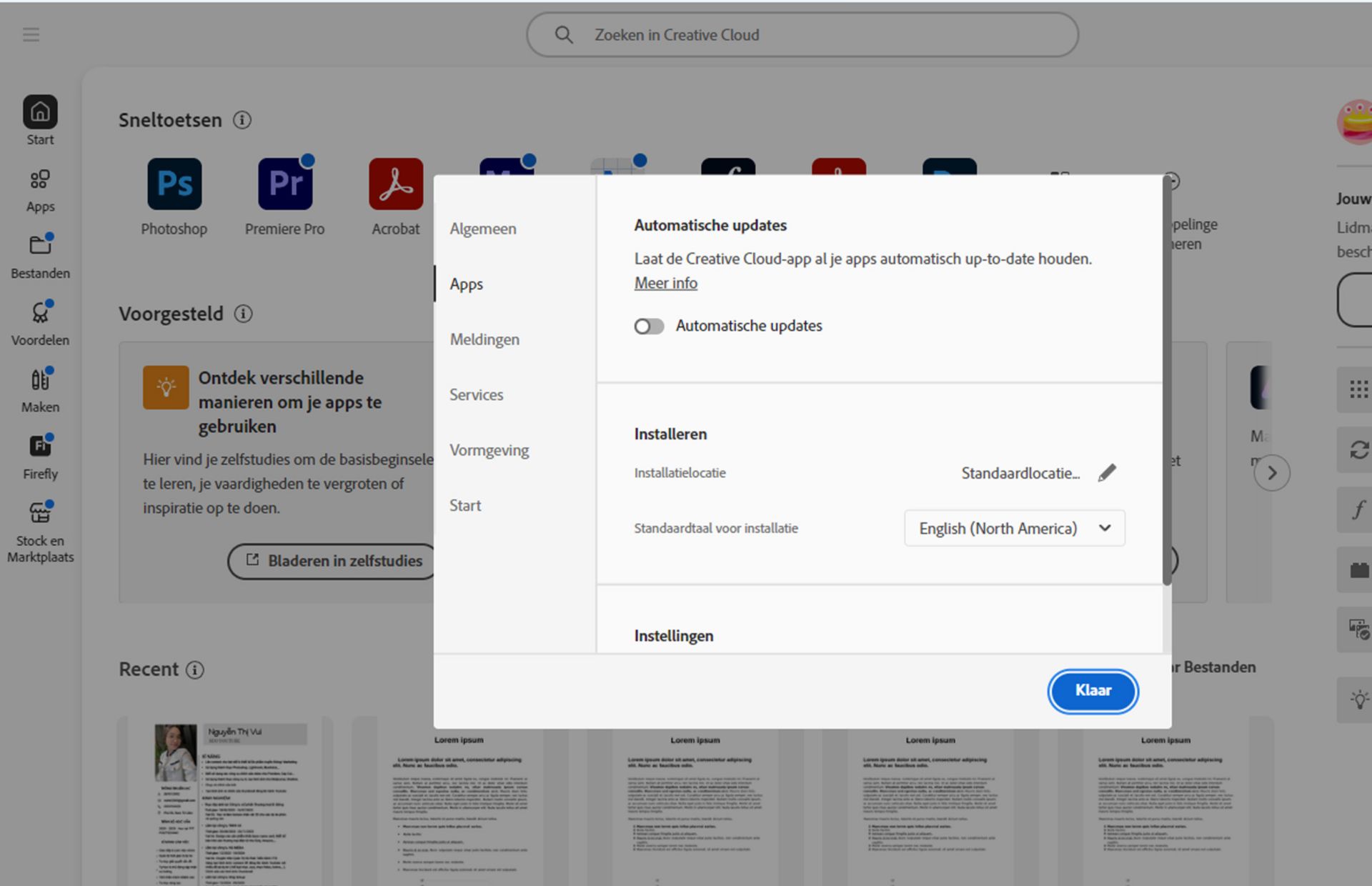 Het voorkeuren-paneel van Adobe Creative Cloud is geopend op het tabblad 'Taal', waarbij de optie om de standaardtaal voor app-installatie in te stellen is gemarkeerd.