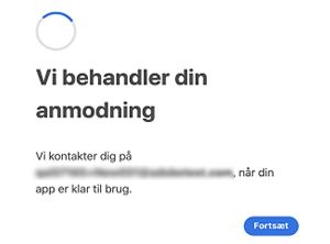 Skærmbilledet Vi behandler din anmodning, der vises, når du åbner produktadgangslinket