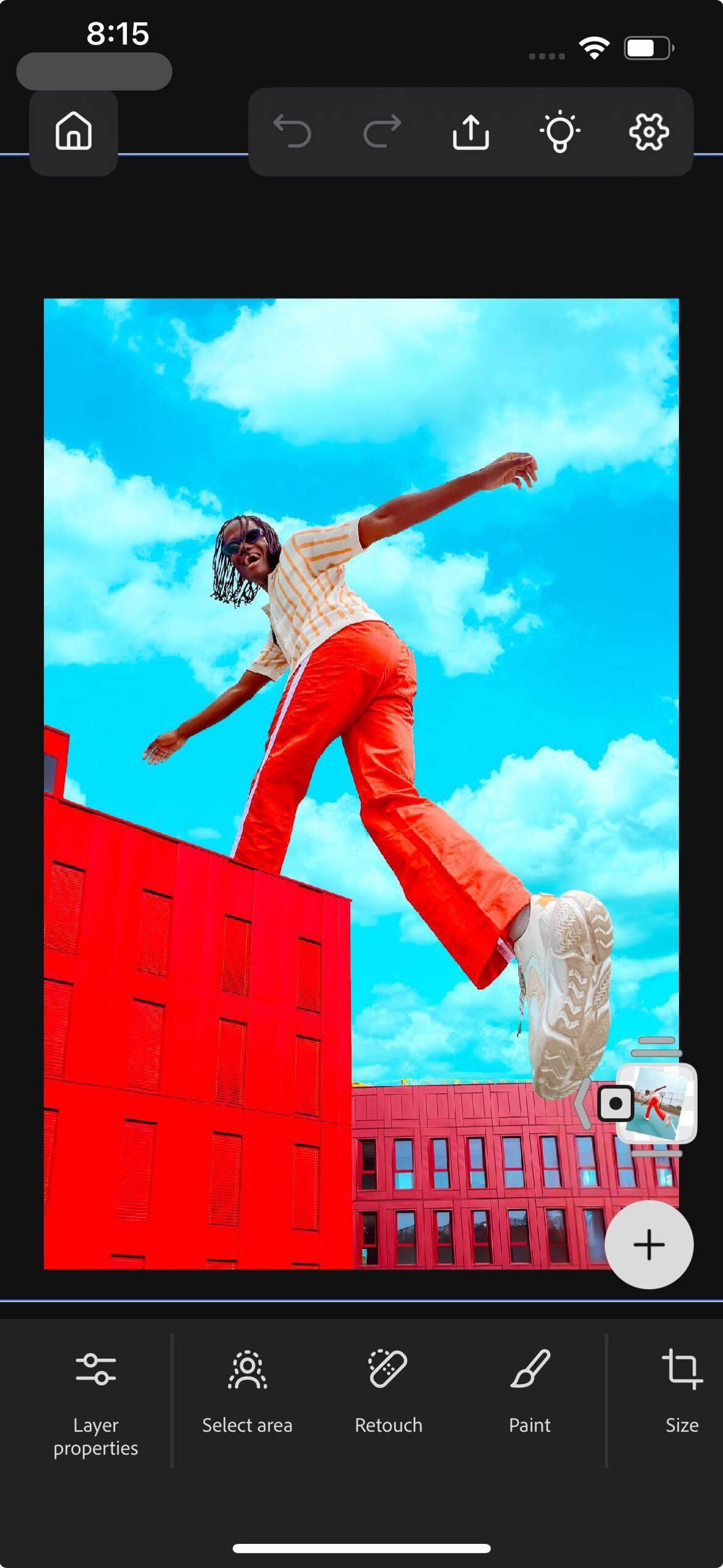 Photoshop on iPhone canvas is shown, displaying tools like Select area, Retouch, Paint, and Transform.  