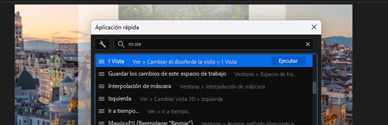 El panel Aplicación rápida de After Effects se abre con “m:view” escrito en la barra de búsqueda, y muestra resultados de comandos de menú en las opciones de Vista, con un botón Ejecutar resaltado.