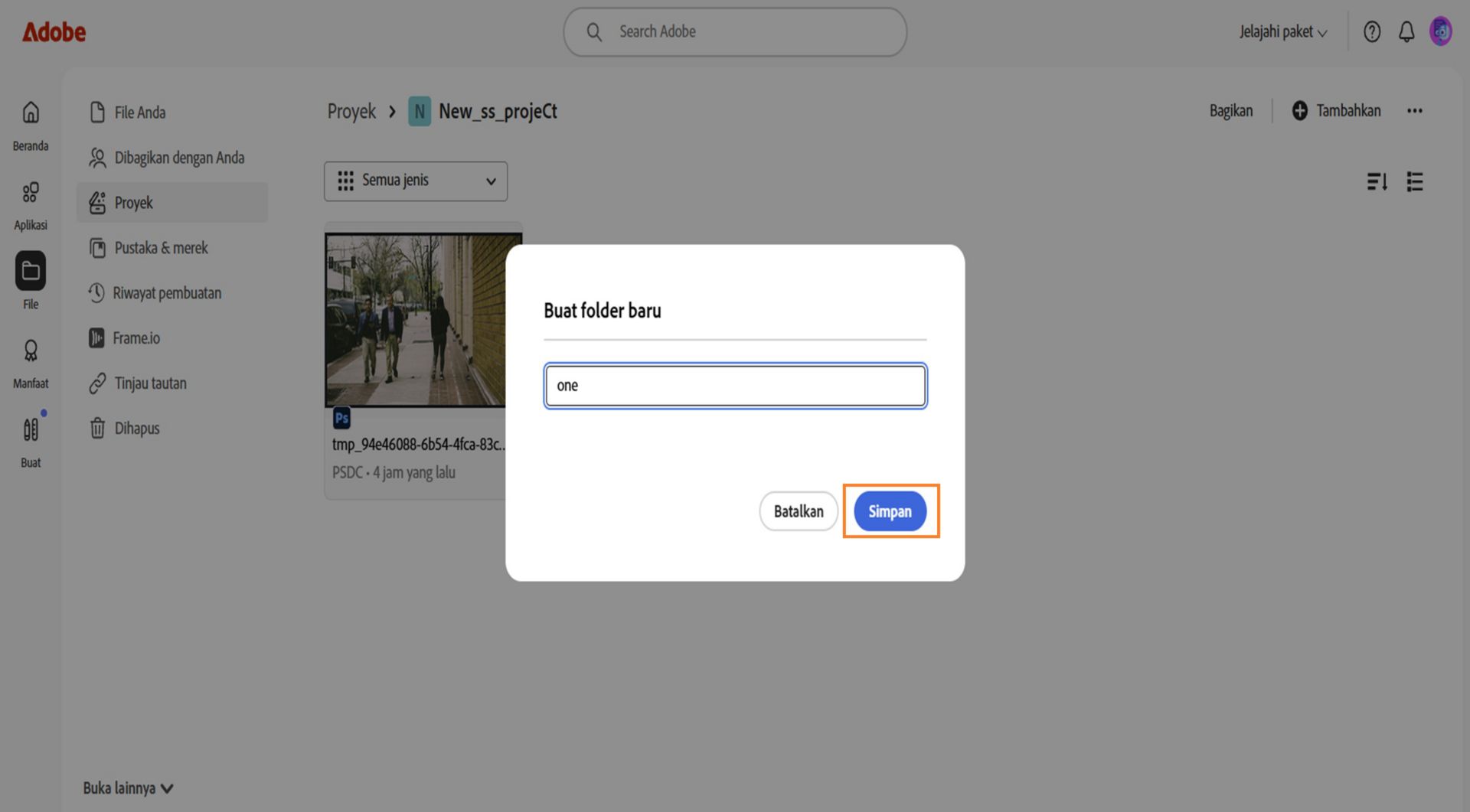 Antarmuka web Adobe yang menampilkan kotak dialog berlabel "Buat folder baru," dengan kolom teks untuk memasukkan nama folder dan opsi untuk membatalkan atau menyimpan.