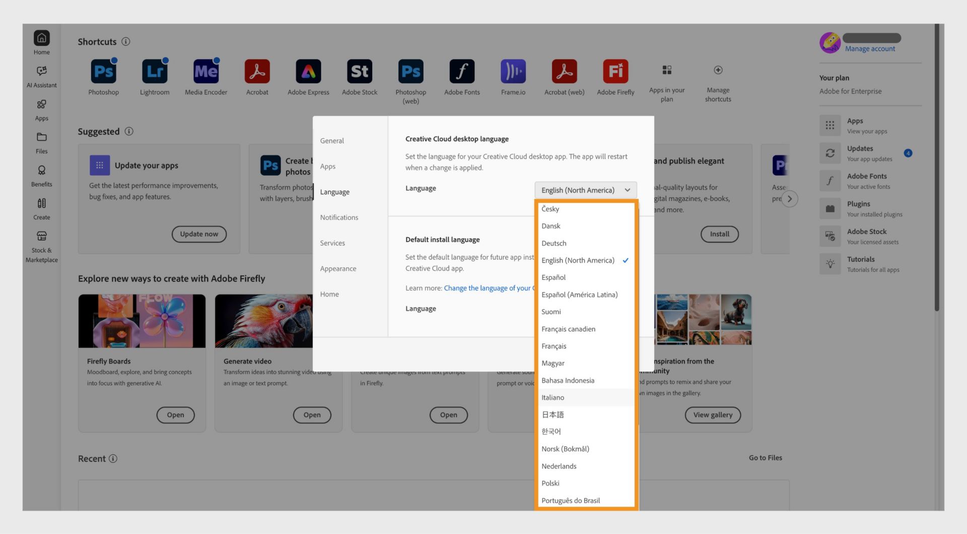 The Language tab of the Preferences window shows options to select the Creative Cloud desktop language and and default install language.