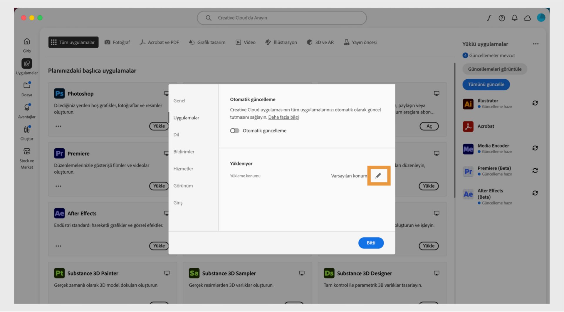 "Uygulamalar" sekmesinde açık olan Adobe Creative Cloud tercihleri paneli, kullanıcıların varsayılan yükleme konumunu ayarlayabilecekleri "Yükleniyor" bölümünü vurguluyor.