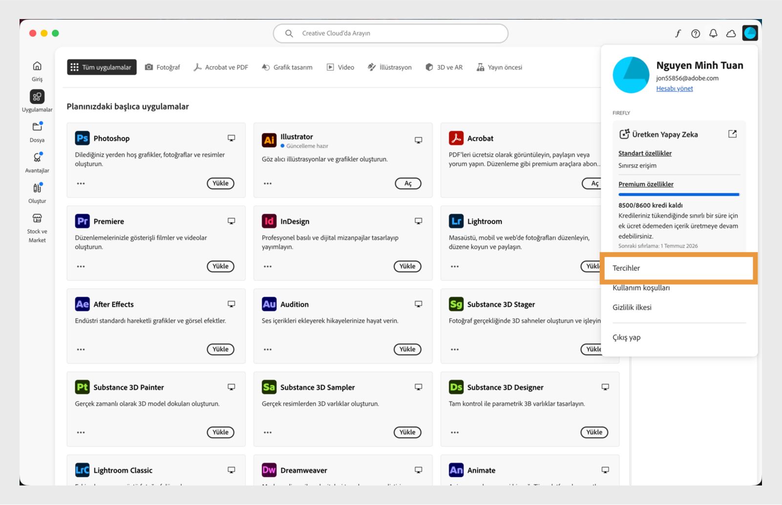Creative Cloud masaüstü uygulaması, Ayarlar seçeneği üzerinde vurgu yapılmış hesap açılır menüsünü görüntüler.